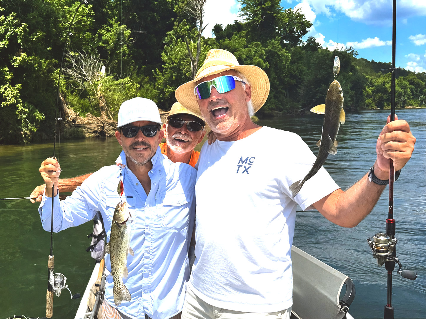 Chad McCutchen, guide Larry Price, and Captain Bill on a White River float. Chunky rainbows all day.
