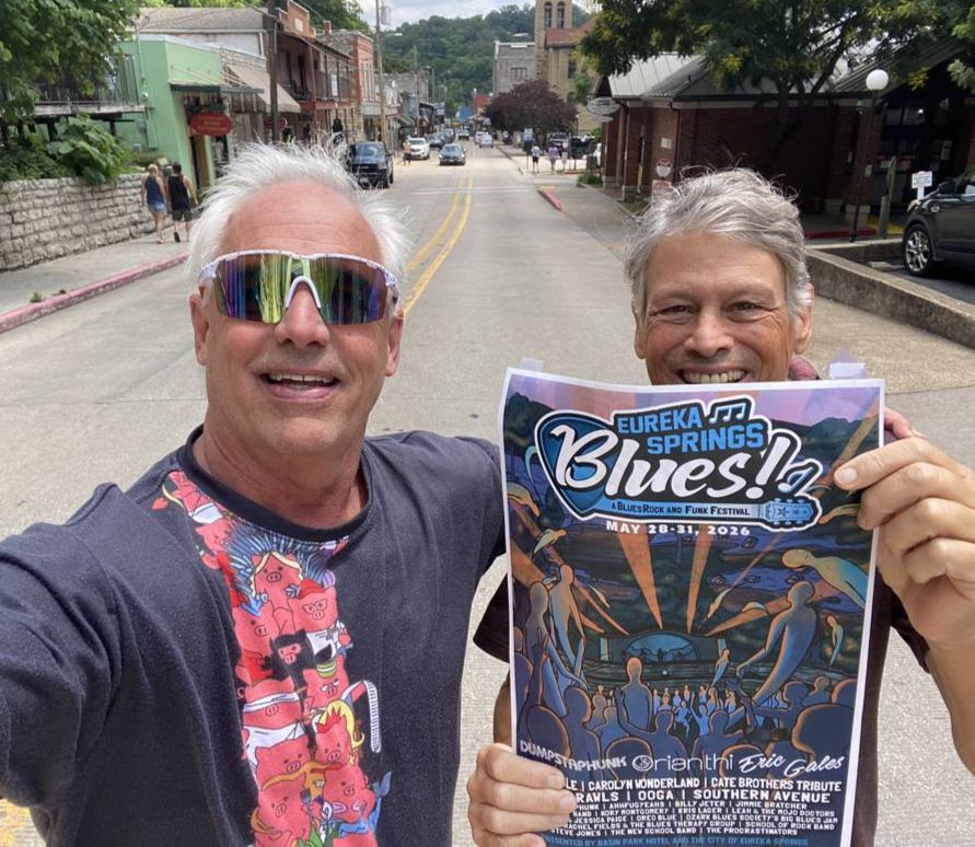Richard and Bill, downtown Eureka Springs, festival poster in hand.