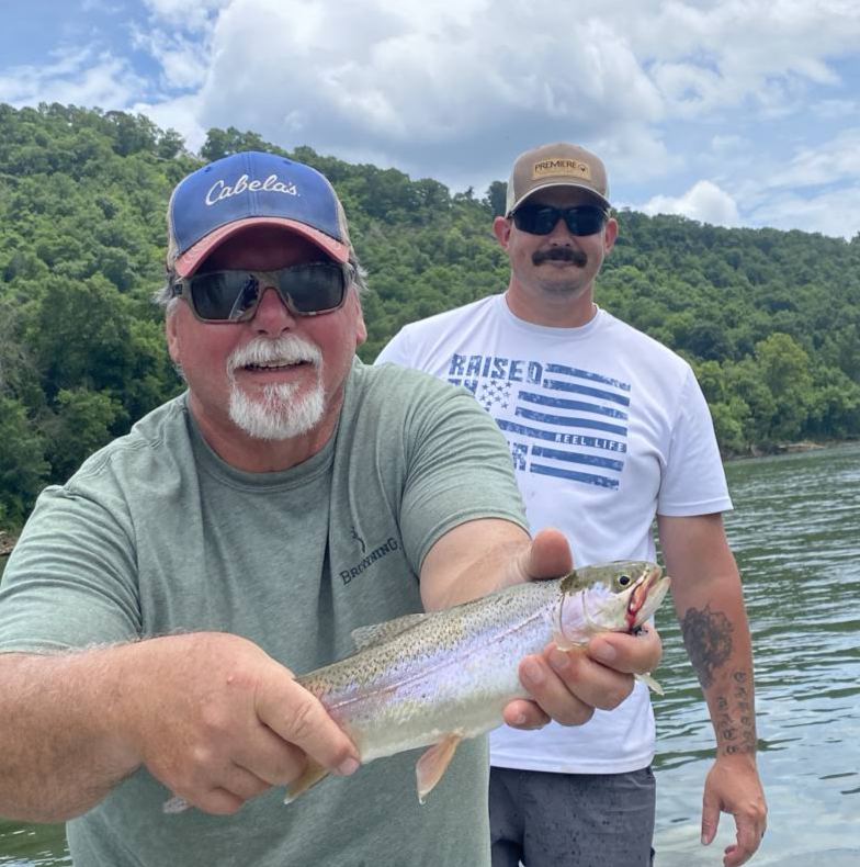 Another Taneycomo rainbow boatside.